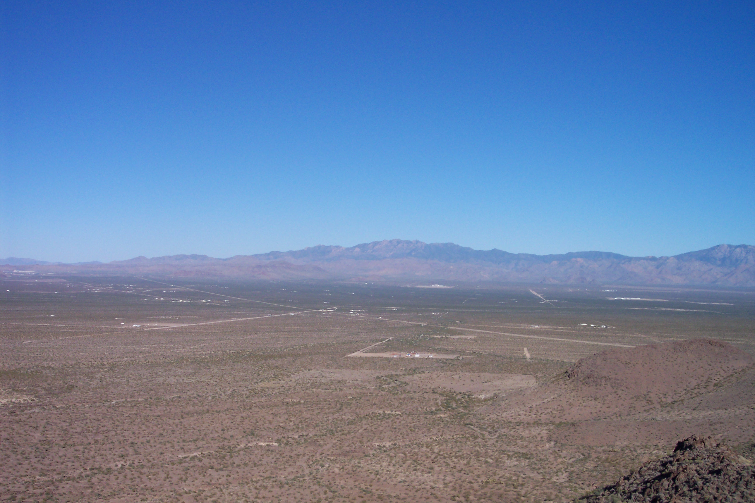 Panoramic photograph of Golden Valley with a wide valley and distant mountains